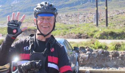 Michael Magee Cycling on the  tour with redspokes